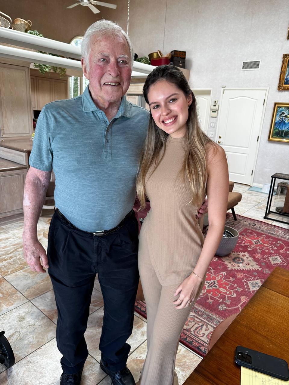 Florencia Hoffmann con John C. Maxwell